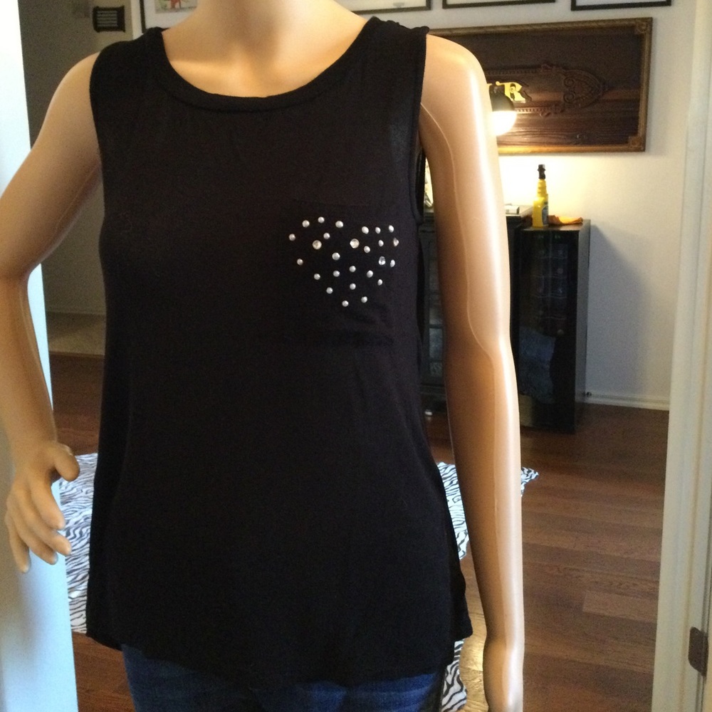 Cute tee by Mnk in size medium.